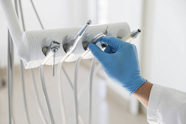 Professional Tooth Extraction technician working in Bellaire, TX